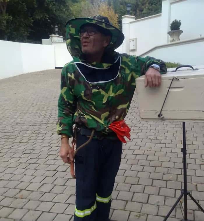 Charles in a bee suit on a callout in Bishopscourt
